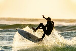 Riding waves, healing minds: how surfing is therapy for the mind and body